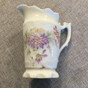 Vintage small white pitcher.